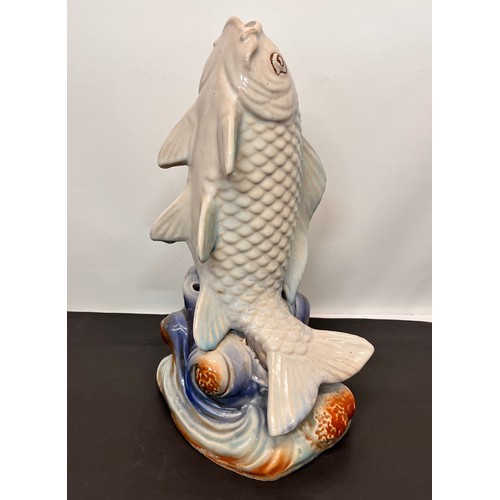 90 - Large ceramic figurine of a carp, 40 cm high

This lot is available for in-house shipping