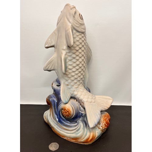 90 - Large ceramic figurine of a carp, 40 cm high

This lot is available for in-house shipping