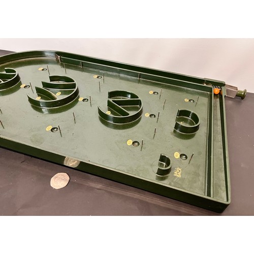 93 - Toys and Games, vintage green Bakelite bagatelle game 63 cm long.

This lot is available for in-hous... 