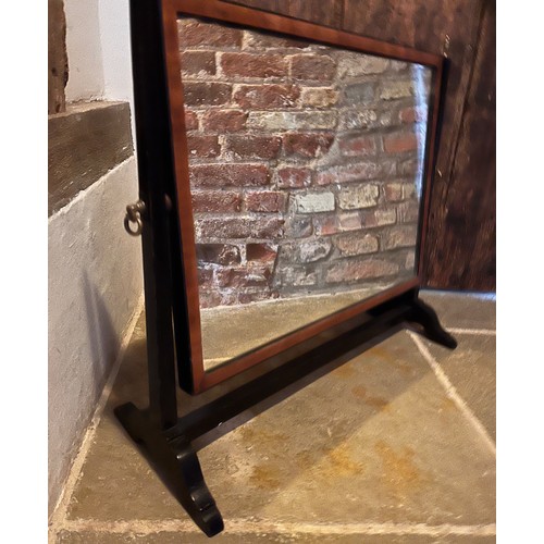 99 - Ebonised table mirror, 38 cm wide 50 cm high 24 deep.

This lot is available for in-house shipping