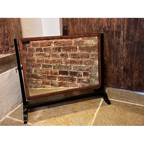 99 - Ebonised table mirror, 38 cm wide 50 cm high 24 deep.

This lot is available for in-house shipping