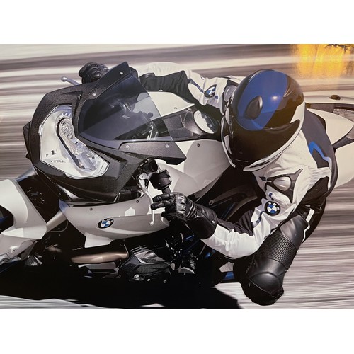 391 - Automobilia, a large BMW motorcycle advertising poster 84 cm x 59 cm.

In house shipping is availabl... 