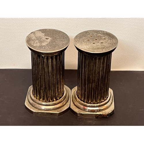 424 - Plated mid century table wares a pair of classical architectural column form salt and pepper shakers... 