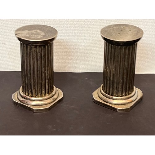 424 - Plated mid century table wares a pair of classical architectural column form salt and pepper shakers... 