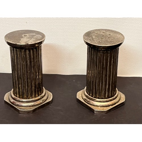 424 - Plated mid century table wares a pair of classical architectural column form salt and pepper shakers... 