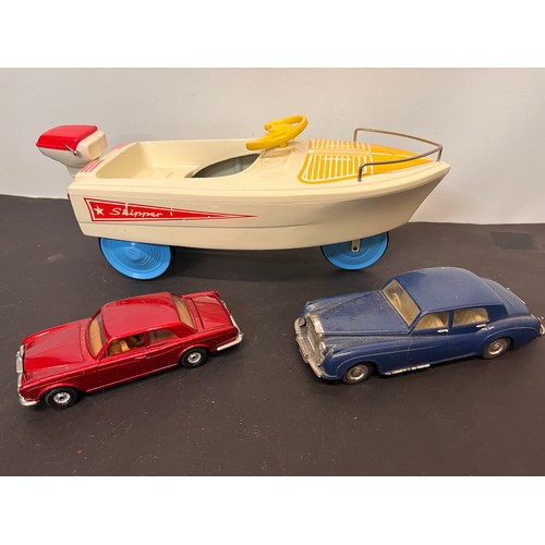 430 - Jolly Roger Boat shaped pedal car and a Rolls Royce and a Bentley motor car models. 

In house shipm... 