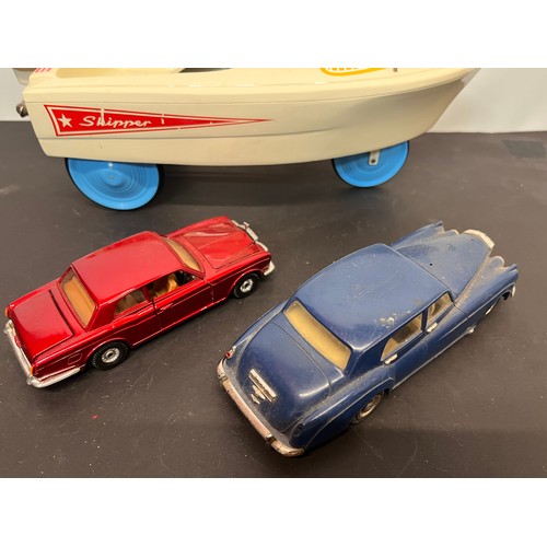 430 - Jolly Roger Boat shaped pedal car and a Rolls Royce and a Bentley motor car models. 

In house shipm... 