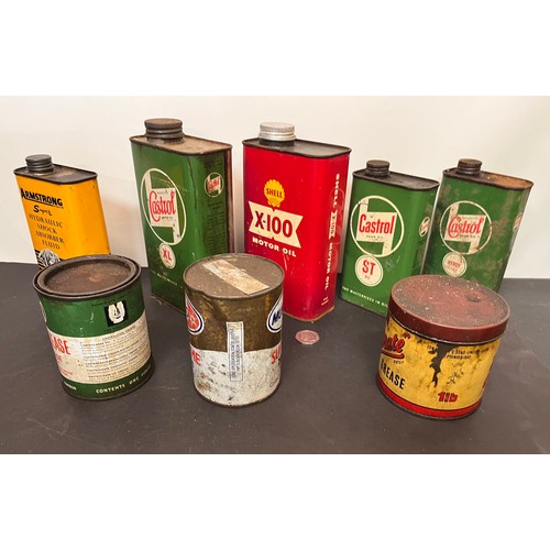 445 - Automobilia, collection of oil cans, a grease tins from an old garage all with product inside.

Coll... 