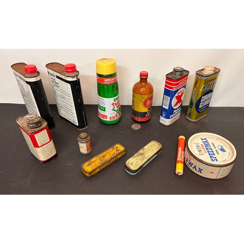 446 - Automobilia, collection of oil cans and car cleaning products from an old garage all with product in... 