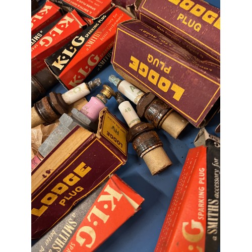 448 - Automobilia, autojumblers lot, a collection of vintage spark plugs from an old garage.

In house shi... 