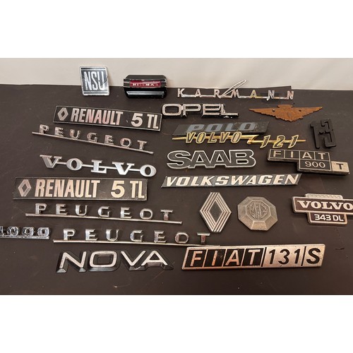 449 - Automobilia, autojumblers lot, a collection of vintage car badges emblems and mascots from an old ga... 