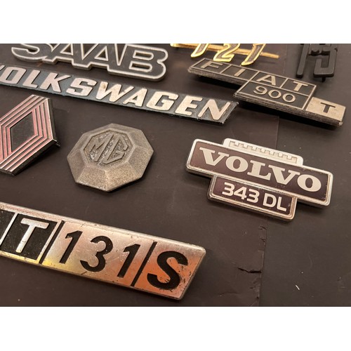 449 - Automobilia, autojumblers lot, a collection of vintage car badges emblems and mascots from an old ga... 