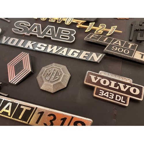 449 - Automobilia, autojumblers lot, a collection of vintage car badges emblems and mascots from an old ga... 