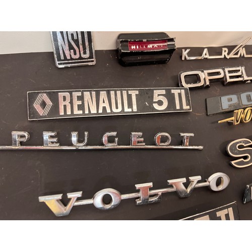 449 - Automobilia, autojumblers lot, a collection of vintage car badges emblems and mascots from an old ga... 