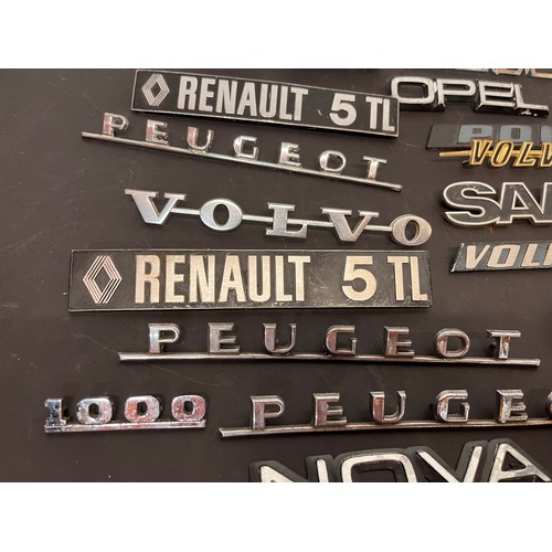 449 - Automobilia, autojumblers lot, a collection of vintage car badges emblems and mascots from an old ga... 