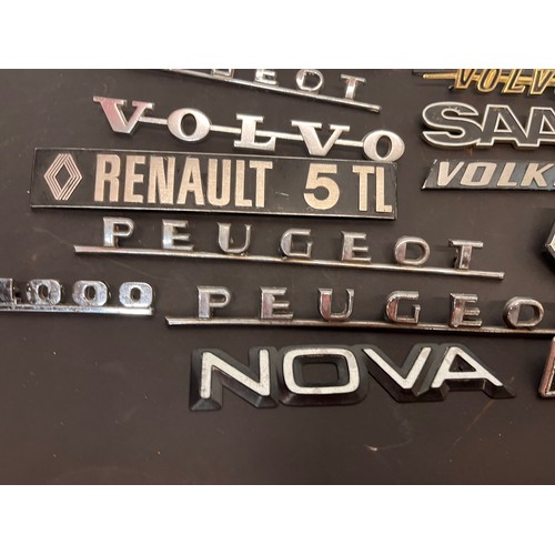 449 - Automobilia, autojumblers lot, a collection of vintage car badges emblems and mascots from an old ga... 