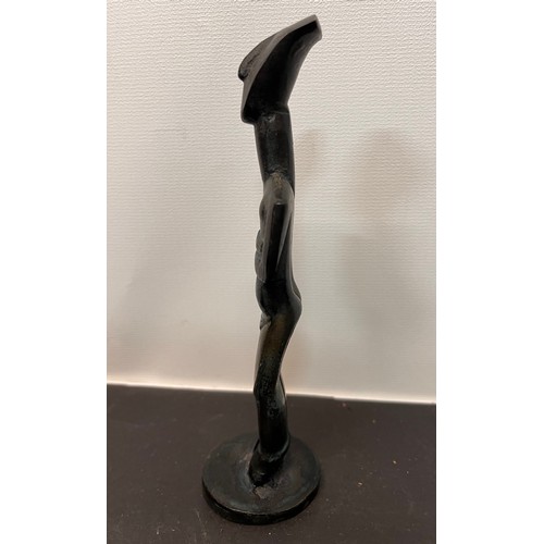 366 - Mid century sculpture, cast bronze of a standing figure with his arms folded. 14.5 cm high

This lot... 