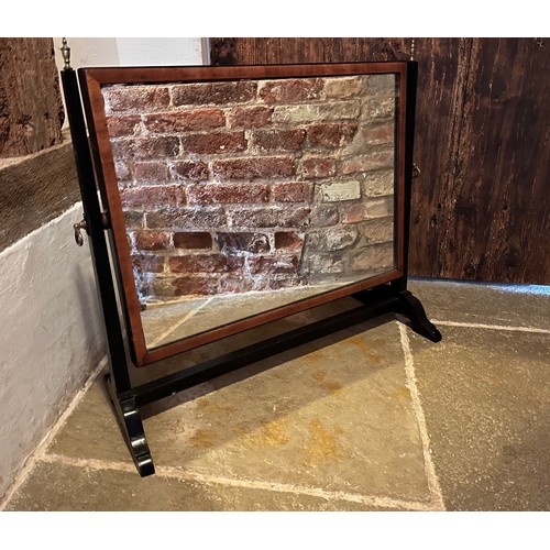 33 - Ebonised table mirror, 38 cm wide 50 cm high 24 deep.

This lot is available for in-house shipping