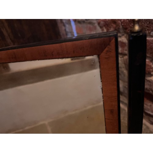 33 - Ebonised table mirror, 38 cm wide 50 cm high 24 deep.

This lot is available for in-house shipping