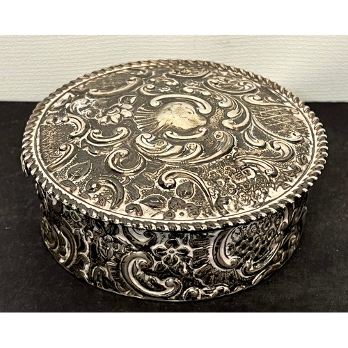 5 - Hallmarked Edwardian silver trinket box with embossed decoration.

This lot is available for in-hous... 