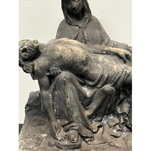 20 - Small cast sculpture of The Pieta.

This lot is available for in-house shipping