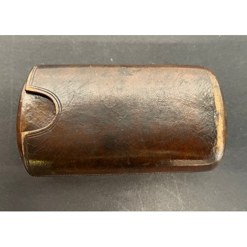 44 - Leather cigar case with a couple of residents included. 5 inches long when fully closed.

This lot i... 