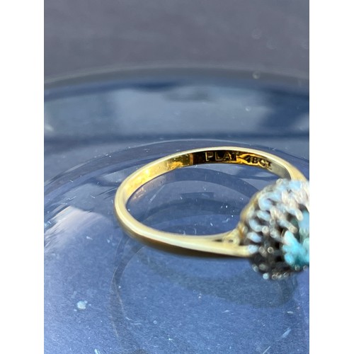 147 - Art Deco ring, a platinum mounted 5.5 mm blue faceted stone surrounded by Diamonds on an 18ct gold r... 