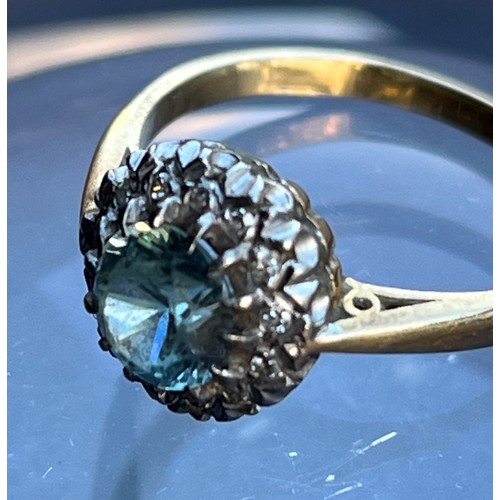 147 - Art Deco ring, a platinum mounted 5.5 mm blue faceted stone surrounded by Diamonds on an 18ct gold r... 