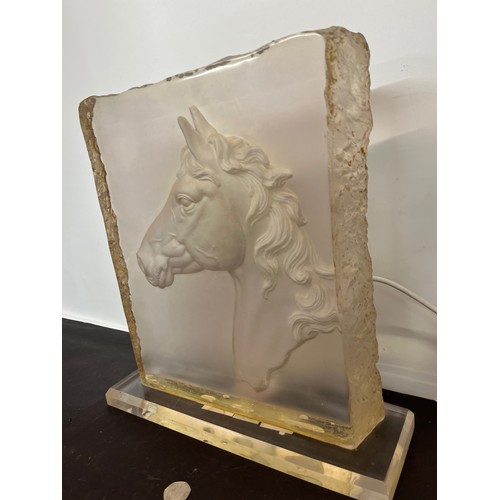 221 - Large sculptural table lamp with a horses head in relief. 38 cm wide x 41 cm high.

This lot is avai... 