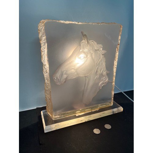 221 - Large sculptural table lamp with a horses head in relief. 38 cm wide x 41 cm high.

This lot is avai... 