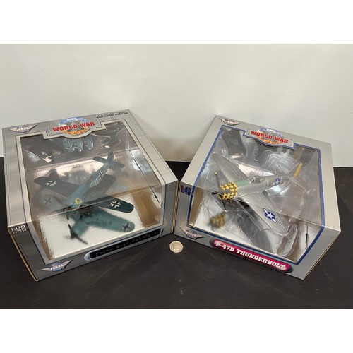 44 - Die cast toys, two models of German and American forces WWII aircraft,.

This lot is available for i... 