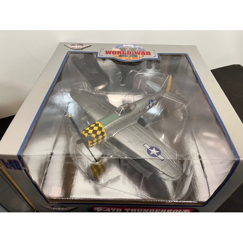 44 - Die cast toys, two models of German and American forces WWII aircraft,.

This lot is available for i... 