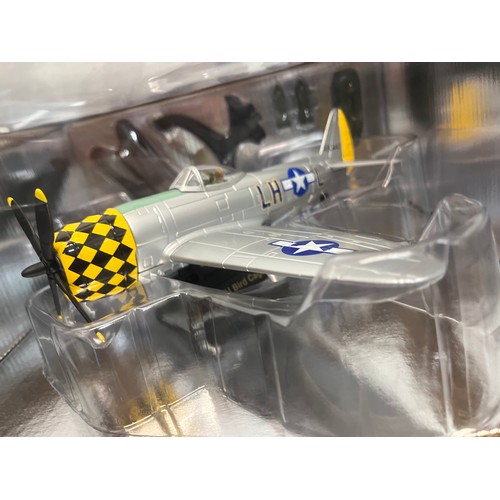 44 - Die cast toys, two models of German and American forces WWII aircraft,.

This lot is available for i... 