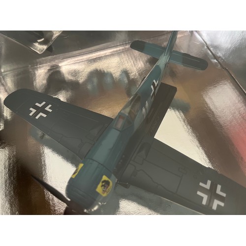 44 - Die cast toys, two models of German and American forces WWII aircraft,.

This lot is available for i... 