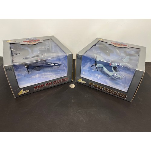 47 - Die cast toys, two models of America Navy WWII aircraft,.

This lot is available for in-house shippi... 