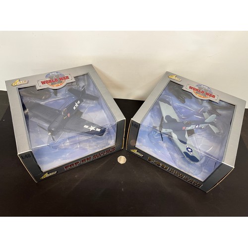 47 - Die cast toys, two models of America Navy WWII aircraft,.

This lot is available for in-house shippi... 