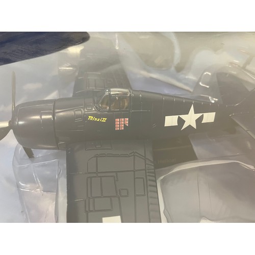 47 - Die cast toys, two models of America Navy WWII aircraft,.

This lot is available for in-house shippi... 