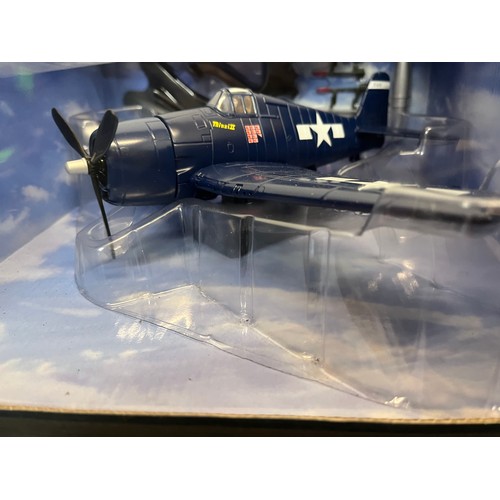 47 - Die cast toys, two models of America Navy WWII aircraft,.

This lot is available for in-house shippi... 