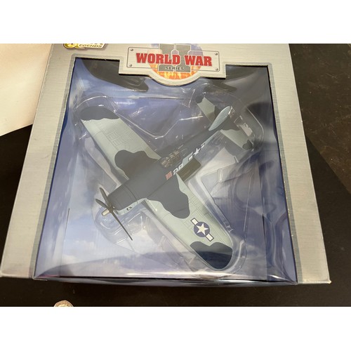 47 - Die cast toys, two models of America Navy WWII aircraft,.

This lot is available for in-house shippi... 