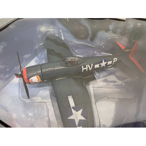 48 - Die cast toys, two models of US forces WWII fighter aircraft,.

This lot is available for in-house s... 