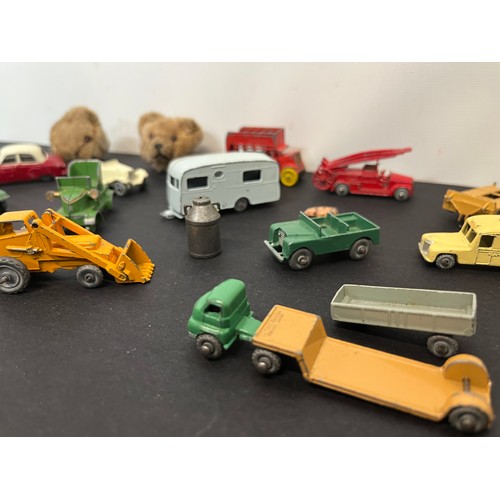 40 - Die cast toys and teddy bears, a collection of diecast cars and trucks etc and two small teddy bear ... 