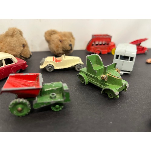 40 - Die cast toys and teddy bears, a collection of diecast cars and trucks etc and two small teddy bear ... 