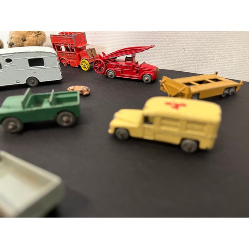 40 - Die cast toys and teddy bears, a collection of diecast cars and trucks etc and two small teddy bear ... 