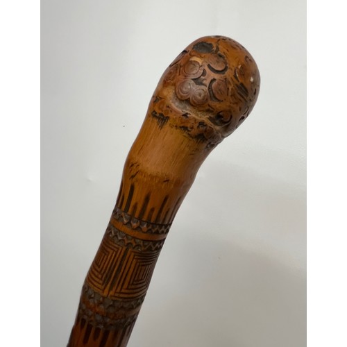 79 - Walking can decorated with oriental carving of figures, and an eagle, 92 cm  long.

This lot is avai... 