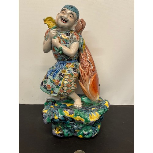 7 - Ceramic figurine of Ebisu the Japanese God of Fishing 31 cm tall.

This lot is available for in-hous... 