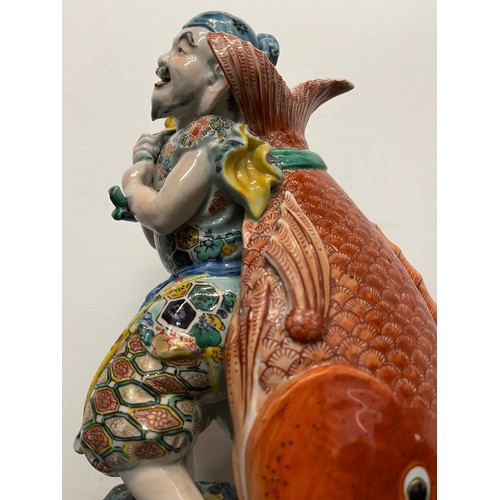 7 - Ceramic figurine of Ebisu the Japanese God of Fishing 31 cm tall.

This lot is available for in-hous... 