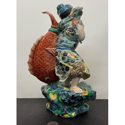 7 - Ceramic figurine of Ebisu the Japanese God of Fishing 31 cm tall.

This lot is available for in-hous... 