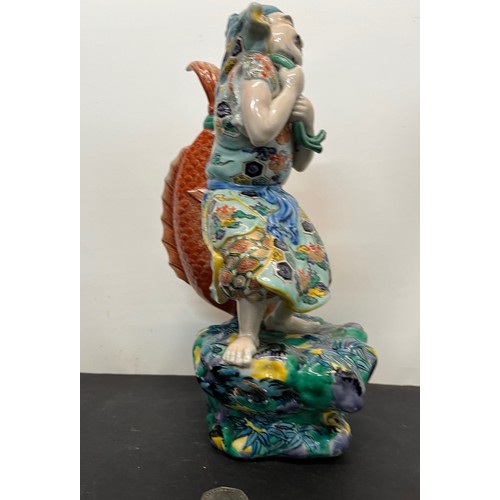 7 - Ceramic figurine of Ebisu the Japanese God of Fishing 31 cm tall.

This lot is available for in-hous... 