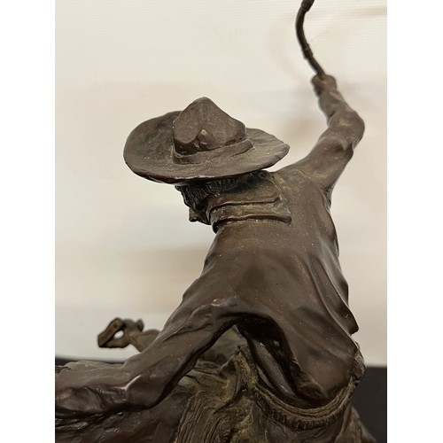 69 - C20th American Remington Cowboy sculpture in bronze. A study after Frederic Remington titled Bronco ... 