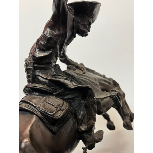 69 - C20th American Remington Cowboy sculpture in bronze. A study after Frederic Remington titled Bronco ... 